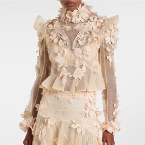 ZIMMERMANN
Hypnotic floral-appliqué silk blouse